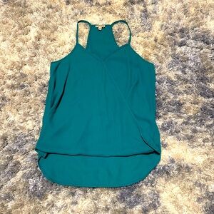 Women’s tank top size XS. Teal/turquoise. Thin sheer material EUC!